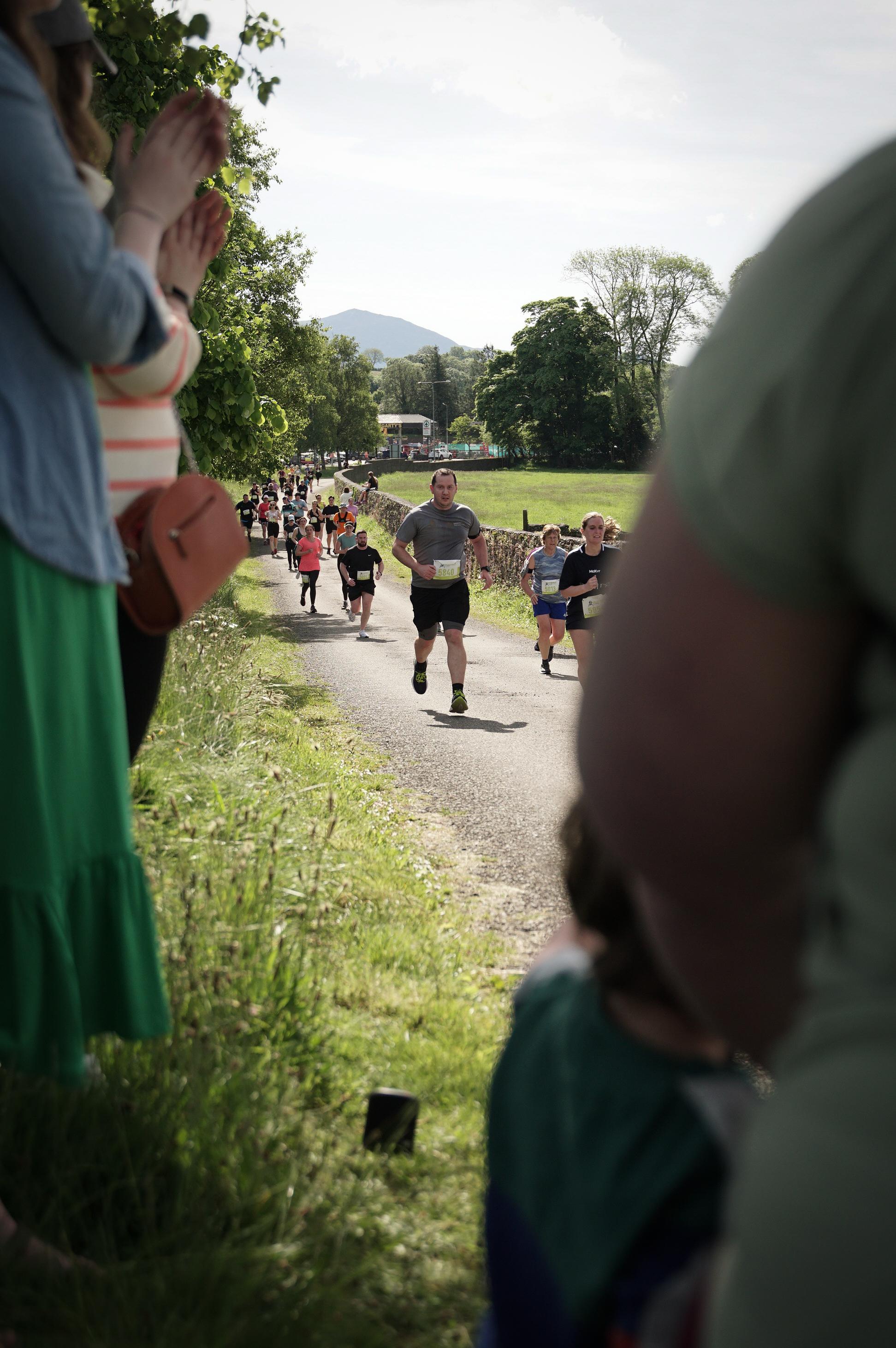 hero image of people running.